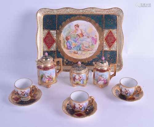 AN UNUSUAL EARLY 20TH CENTURY VIENNA PORCELAIN MINIATURE TEASET with matching tray, decorated with