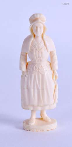 AN UNUSUAL LATE 19TH CENTURY EUROPEAN IVORY SEAL in the form of a standing female. 6.75 cm high.