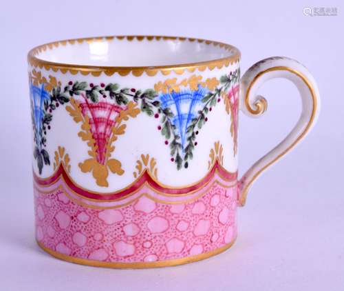 Sevres small coffee can painted with alternate blue and puce hop trellis above a shaped cracked