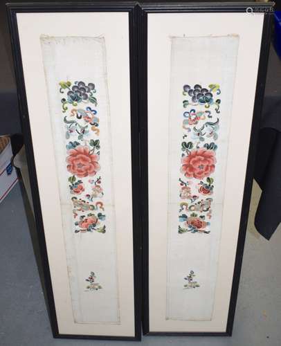 A PAIR OF CHINESE SILK PANELS, depicting flowers.83 cm x 13 cm.