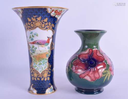 A WALTER MOORCROFT BULBOUS VASE together with a Booths blue scale vase. 13 cm & 17 cm high. (2)