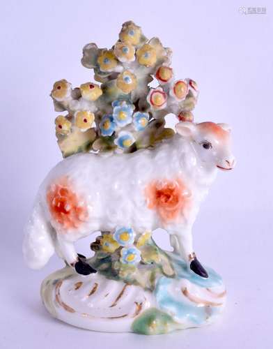 18th c. Derby figure of a sheep before a small brocage, patch marks to base. 10 cm high.