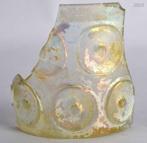 A Part Glass Jug, Persian, 9th/10th Century, together with another early iridescent part glass