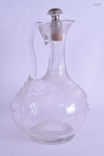 A FINE 19TH CENTURY CONTINENTAL ENGRAVED GLASS CARAFE with silver stopper, decorated with a monogram