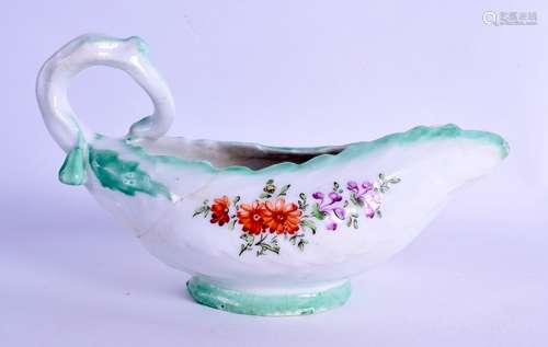 Longton Hall cos lettuce leaf sauceboat painted with flowers. 18 cm wide.