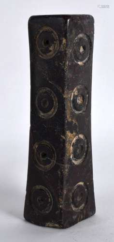 A Persian Carved Stone Element, Possibly Jasper, decorated with circular motifs. 5.75ins high.