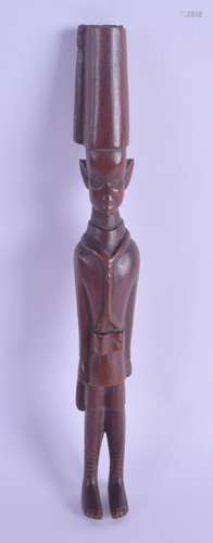 AN UNUSUAL AFRICAN COLONIAL TRIBAL CARVED HARDWOOD FIGURE modelled as a slender male. 22 cm high.