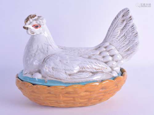 A 19TH CENTURY CONTINENTAL STAFFORDSHIRE STYLE TUREEN AND COVER in the form of a recumbent hen. 20