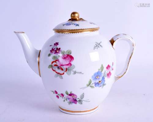 Sevres teapot and cover painted with flowers, hard-paste after 1772. 15 cm wide.