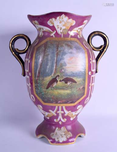 A LARGE LATE 19TH CENTURY FRENCH PARIS PORCELAIN TWIN HANDLED VASE painted with landscapes upon a