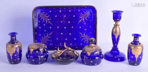 A BOHEMIAN BLUE AND GILT GLASS LADIES VANITY TRAY with matching vases, stick, ring tray etc. Tray 24