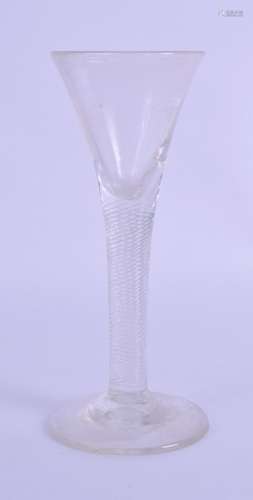 AN 18TH CENTURY WINE GLASS with fine spirally twisted stem. 15.5 cm high.