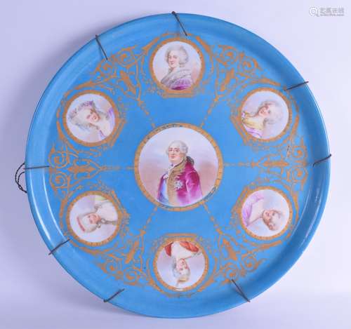 A GOOD LARGE 19TH CENTURY SEVRES PORCELAIN CHARGER painted with seven portraits of French royalty