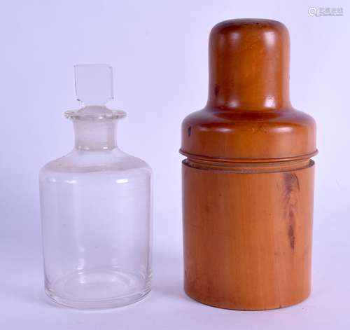 A LATE VICTORIAN BOXWOOD CASED TREEN SCENT BOTTLE AND STOPPER with glass bottle to interior. 14 cm