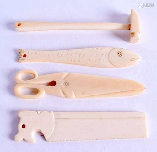 A COLLECTION OF 19TH CENTURY CARVED IVORY TOOLS including a saw & hammer. (4)