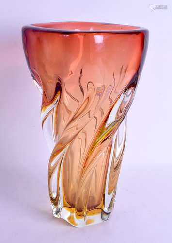 A STYLISH ORANGE GLASS SPIRALLY TWISTED VASE. Signed and dated 1980. 33 cm high.