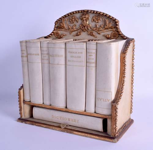 A RARE ASPREYS OF LONDON LIBRARY VELLUM BOOK RACK contained within a painted gilt frame, decorated