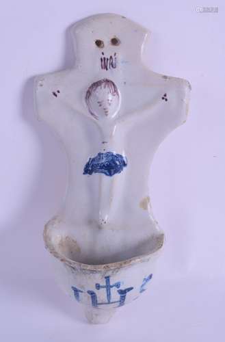 A RARE 17TH/18TH CENTURY CONTINENTAL FAIENCE POTTERY FONT depicting a naive depiction of Christ.