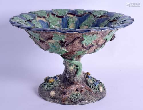 AN UNUSUAL 19TH CENTURY CONTINENTAL MAJOLICA ENCRUSTED COMPORT probably Palissy ware, overlaid