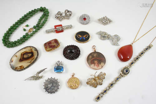 A QUANTITY OF JEWELLERY including a Victorian oval- shaped garnet brooch, a pair of jade stud