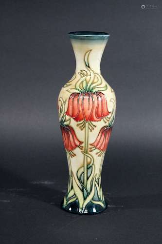 MOORCROFT VASE a boxed modern limited edition Moorcroft vase, with a floral design on a cream