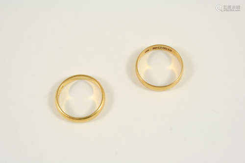 A 22CT. GOLD WEDDING BAND 4.1 grams, size R, together with another 22ct. gold wedding band, 5.5