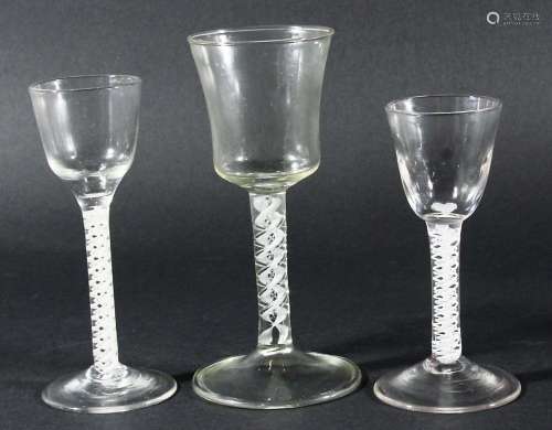 GEORGE III WINE GLASS, the ogee bowl on a stem with a multi-strand twist and double helix and