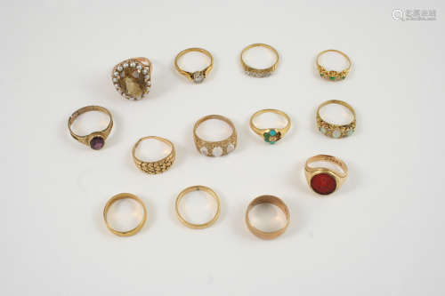 THIRTEEN ASSORTED GOLD AND GEM SET RINGS including a moonstone and diamond ring, set in 9ct. gold,