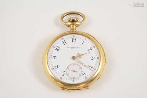 AN 18CT. GOLD OPEN FACED KEYLESS MINUTE REPEATING POCKET WATCH BY PATEK PHILIPPE the white enamel