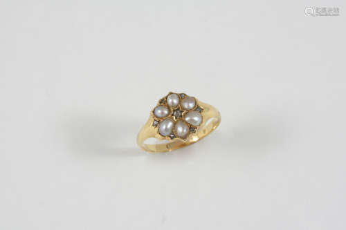 A DIAMOND AND PEARL CLUSTER RING set with rose-cut diamonds and half pearls, in 18ct. gold. Size L