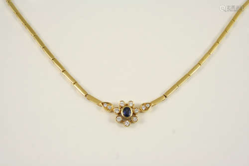 A SAPPHIRE, DIAMOND AND GOLD NECKLACE the 9ct. gold flexible necklace is centred with a sapphire and