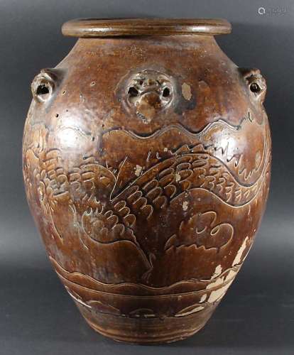 SOUTH EAST ASIAN STONEWARE FLOOR VASE, Song style, of ovoid form with animal head handles and