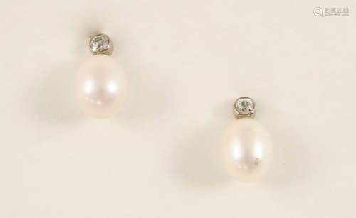 A PAIR OF CULTURED PEARL AND DIAMOND DROP EARRINGS each earring set with a cultured pearl drop