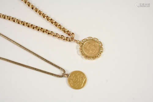 A GOLD SHIELD GUINEA 1868, in a 9ct. gold pendant mount, on a 9ct. gold hammered circular link