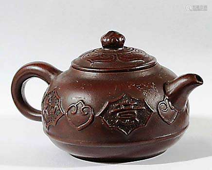 CHINESE YIXING BROWN STONEWARE TEAPOT AND COVER, with ruyi and cartouche decoration, impressed
