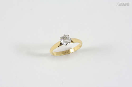 A DIAMOND SOLITAIRE RING the circular old brilliant-cut diamond is set in 18ct. gold. Size M 1/2.