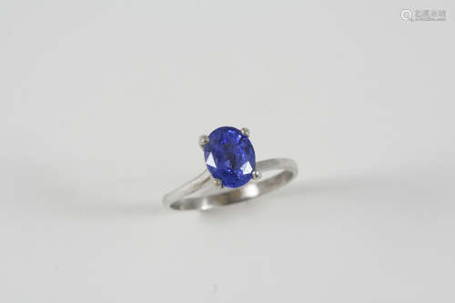 A SAPPHIRE SINGLE STONE RING set with an oval-shaped sapphire weighing 3.05 carats. Size P 1/2.