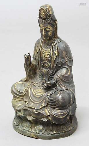 BRONZE GUANYIN, seated on a double lotus base, hands in mudra, height 34cm