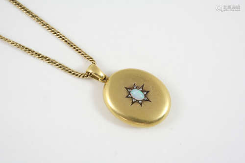 A VICTORIAN GOLD, OPAL AND DIAMOND LOCKET PENDANT the oval-shaped locket is mounted with an oval