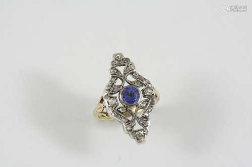 A VICTORIAN DIAMOND CLUSTER RING the openwork design is centred with a circular-cut sapphire and set