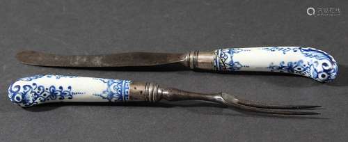 BOW PISTOL GRIP KNIFE AND FORK, circa 1770, blue painted with scrolls and foliage, white metal