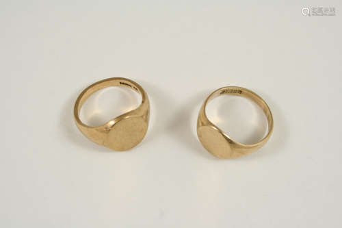 A 9CT. GOLD SIGNET RING 8.6 grams, size U, together with another 9ct. gold signet ring, 6.2 grams,