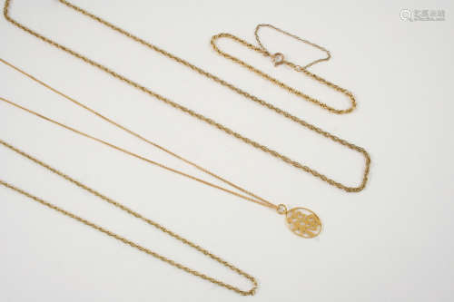 A 14CT. GOLD PENDANT depicting a Chinese character, on a 14ct. gold chain, 3 grams, together with