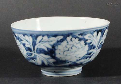 CHINESE BLUE AND WHITE BOWL, possibly 17th century, painted with chrysanthemum and scrolling