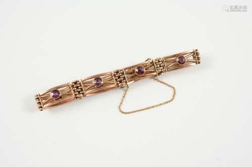 A 9CT. GOLD GATE LINK BRACELET each link centred with a circular-cut amethyst, 13 grams.