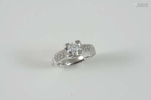 A DIAMOND SOLITAIRE RING the brilliant-cut diamond weighs approximately 0.50 carats and is set