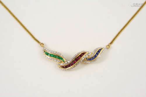 A GOLD, DIAMOND AND GEM SET NECKLACE the 18ct. gold scrolling mount is set with calibre-cut