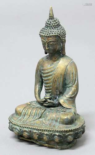 BRONZE BUDDHA, seated holding a vase, on a lotus base, height 29cm