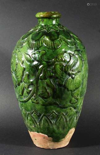 CHINESE HAN STYLE VASE, decorated with flowers and scrolling foliage in relief beneath a green
