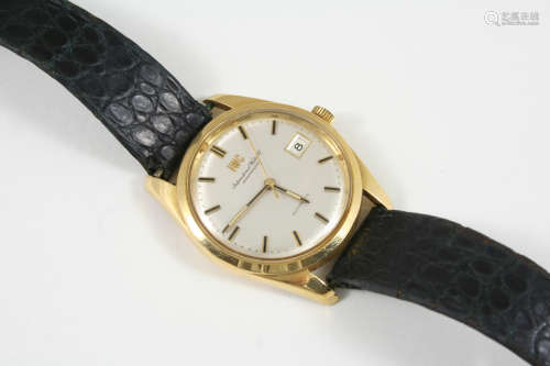 A GENTLEMAN'S 18CT. GOLD AUTOMATIC WRISTWATCH BY IWC the signed circular dial with baton numerals